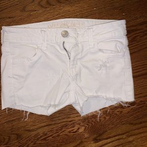 distressed white American Eagle jean shorts